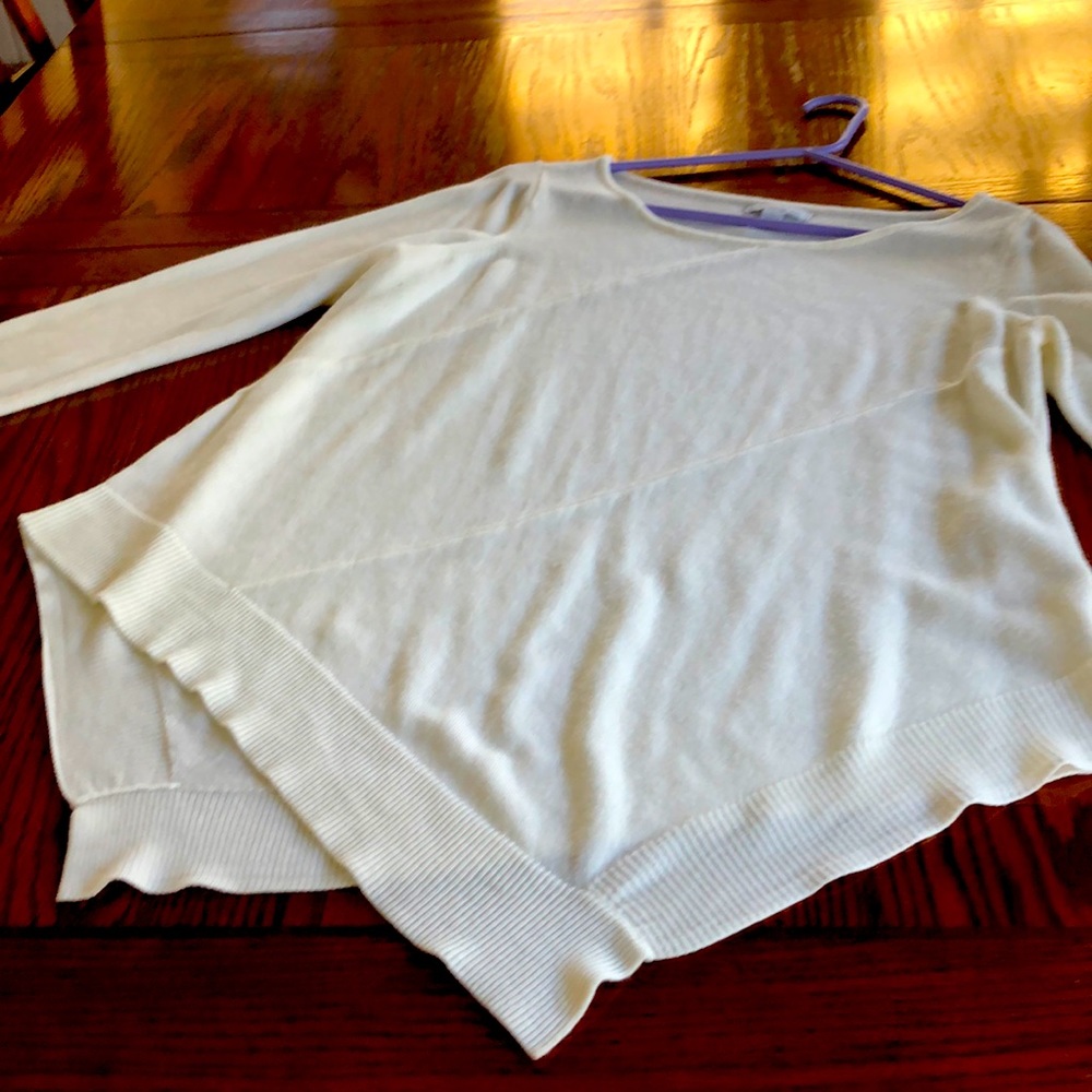 Woman’s cream sweater